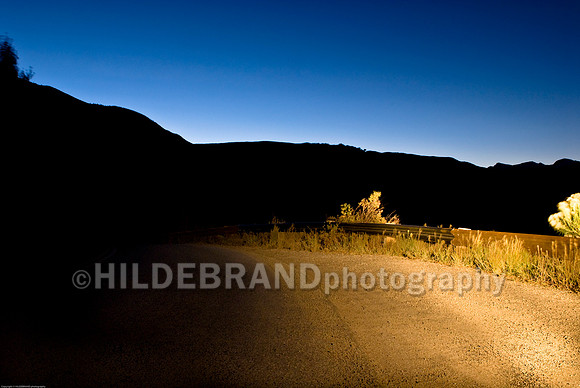 Headlights on Morning Road